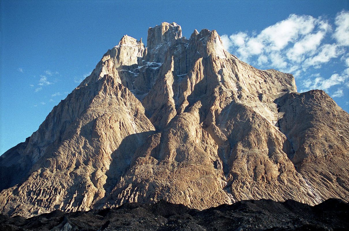 16 Trango Castle From Khoburtse Early Morning The early morning sun silhouettes the ridges of Trango Castle from Khoburtse.